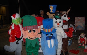 Joint Base Charleston-Weapons Station held its Holiday Festival, Dec. 8 at the Redbank Club. Greeting holiday revelers were volunteers from the base teen center dressed as Chrtistmas legends and the characters from the children's game Candyland.