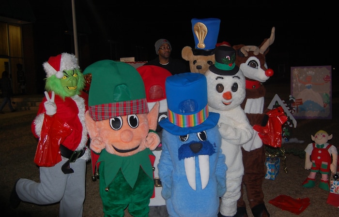 Joint Base Charleston-Weapons Station held its Holiday Festival, Dec. 8 at the Redbank Club. Greeting holiday revelers were volunteers from the base teen center dressed as Chrtistmas legends and the characters from the children's game Candyland.