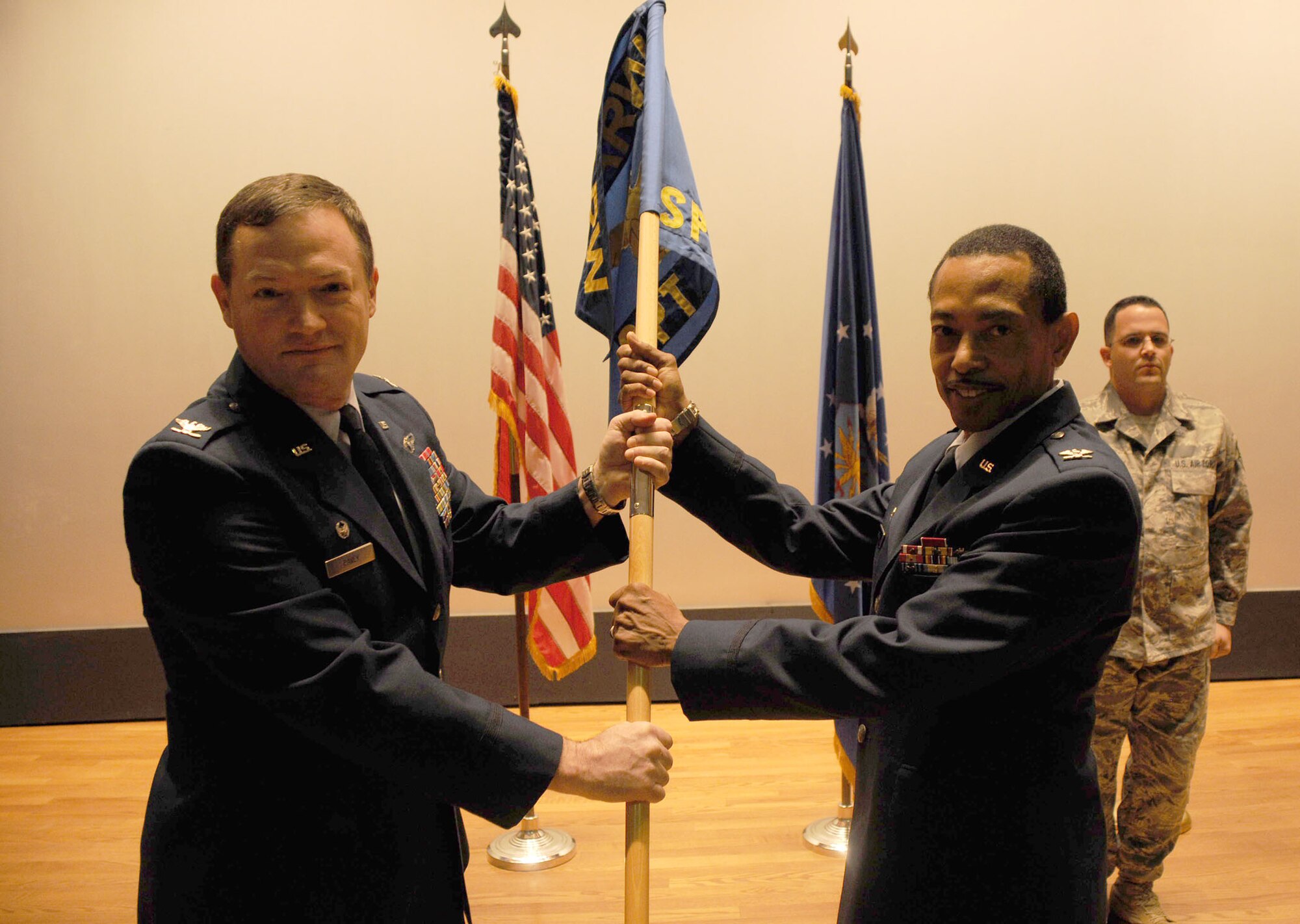 MacDill Air Force Base, Fla. --  Colonel Matthew Pavey transfers command of the 927th Mission Support Group to Col. Rodney Bryan during a ceremony here Decemeber 4.  Bryan previosuly commanded the 507th Mission Support Group at Tinker AFB, Okla. (Official United States Air Force photo by Staff Sgt. Shawn C. Rhodes)