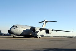 Air Force Lt. Gen. Allen G. Peck taxis in the newest C-17A aircraft on the Joint Base Charleston, S.C., flightline Dec. 9, 2010. The arrival of the aircraft bring the total number of C-17s assigned to the 437th Airlift Wing to 58. General Peck is the Air University commander. (U.S. Air Force photo/Staff Sgt. Marie Brown)