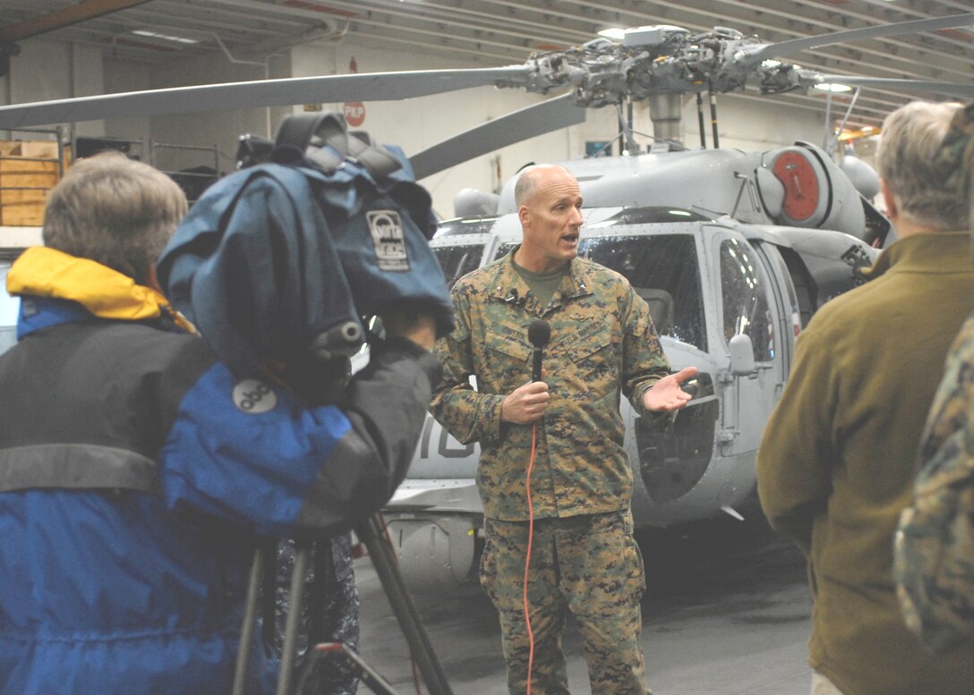 Brig. Gen. Christopher S. Owens, Deputy Commanding General of II Marine Expeditionary Force, speaks with news reporters about the future of amphibious operations in the Marine Corps during Exercise Bold Alligator 2011 - the first brigade-level amphibious exercise conducted in ten years since the Corps' involvement in Iraq and Afghanistan.