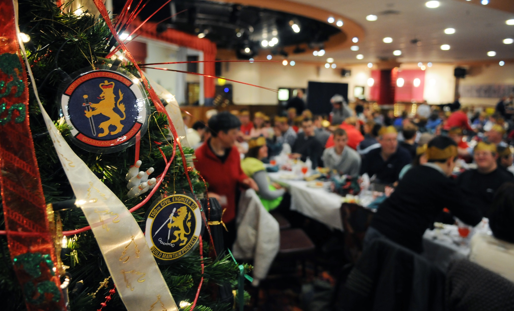 RAF MILDENHALL, England -- Units from across base here sponsored Christmas trees which were on display at the Special Persons' Holiday Party at the Galaxy Club Dec. 11, 2010. More than 350 students from about 20 schools traveled up to four hours for the event that included food, dancing and gifts. (U.S. Air Force photo/Staff Sgt. Thomas Trower)