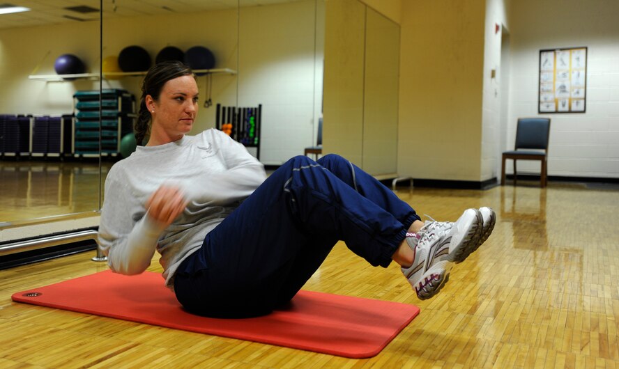 Staff Sgt. Sara Margaret Luna, 22nd Comptroller Squadron financial analyst, performs the Mason Twist Dec. 15, 2010, McConnell Air Force Base, Kan. Sergeant Luna improved her fitness score by following a basic fitness schedule and attained an excellent on her Dec. 2, 2010 test.  (U.S. Air Force photo/Airman 1st Class Armando A. Schwier-Morales) 