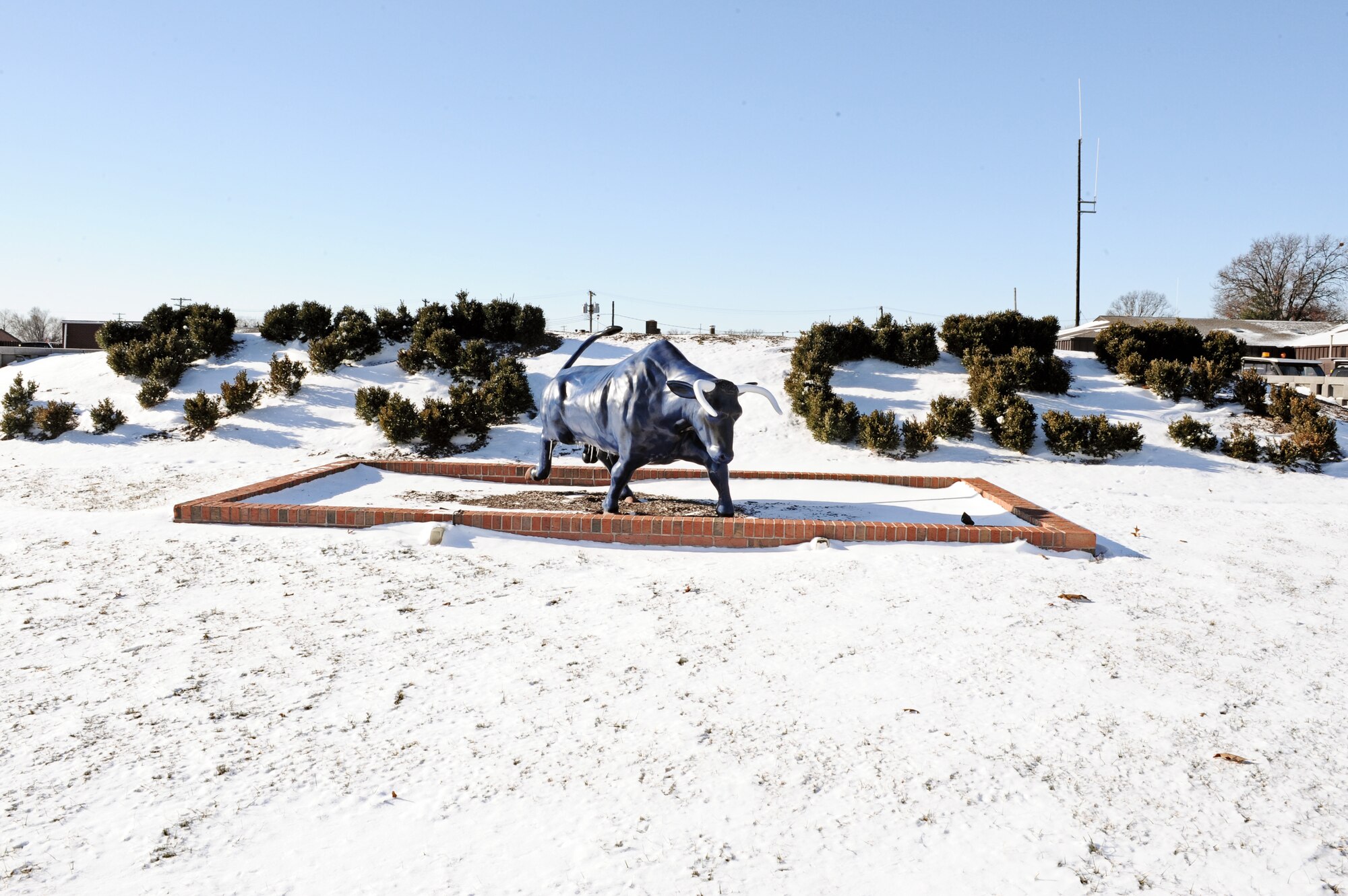 The 375th Civil Engineer Squadron’s bull is surrounded by snow after the first snow fall of the winter season at Scott Air Force Base, Ill. Dec. 13, 2010. Scott turned into a “winter wonderland” as it received its first snow of the winter season Dec. 12. (U.S. Air Force photo/Staff Sgt. Brian J. Valencia)