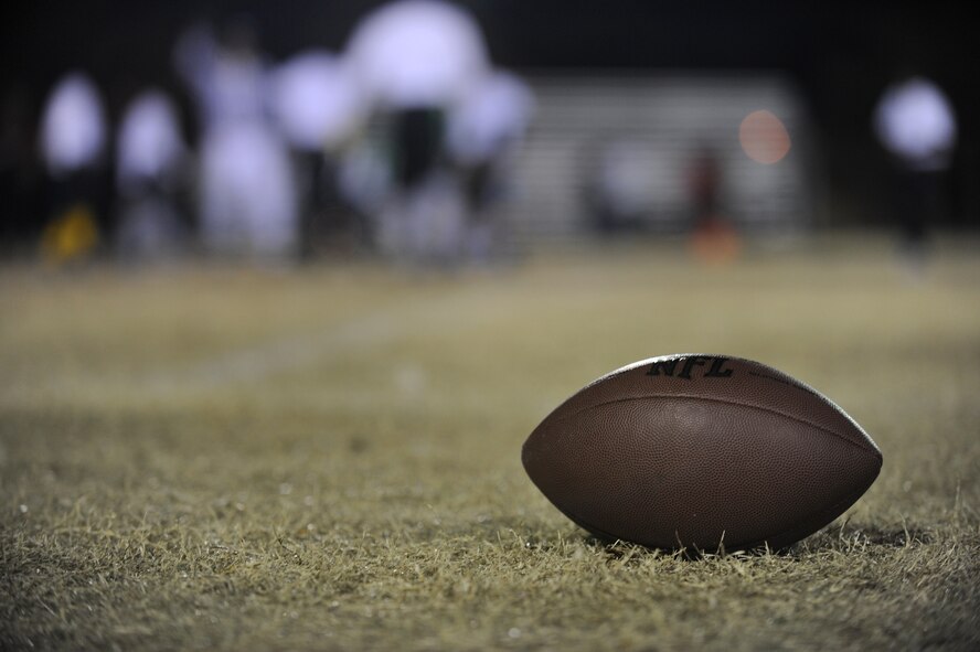 MOODY AIR FORCE BASE, Ga. -- A football sits along the sideline of a football field during the championship flag football game Dec. 13. The game was between the undefeated 23rd Medical Group and the 23rd Operational Support Squadron. (U.S. Air Force photo/Airman 1st Class Douglas Ellis)(RELEASED)