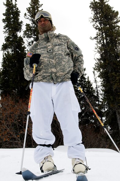 Sgt. Zeresenai Mengistu, 6th Engineer Battalion, models the Army?s cross-country skiing equipment, Feb. 26, 2009, during Cold Weather Leaders Course ski progression training at the Black Rapids Training Site. Troops trained in military skiing can rapidly apply their skills using civilian ski equipment which, though not as robust, can be lighter and easier to use. (Photo by David Bedard/JBER PAO)