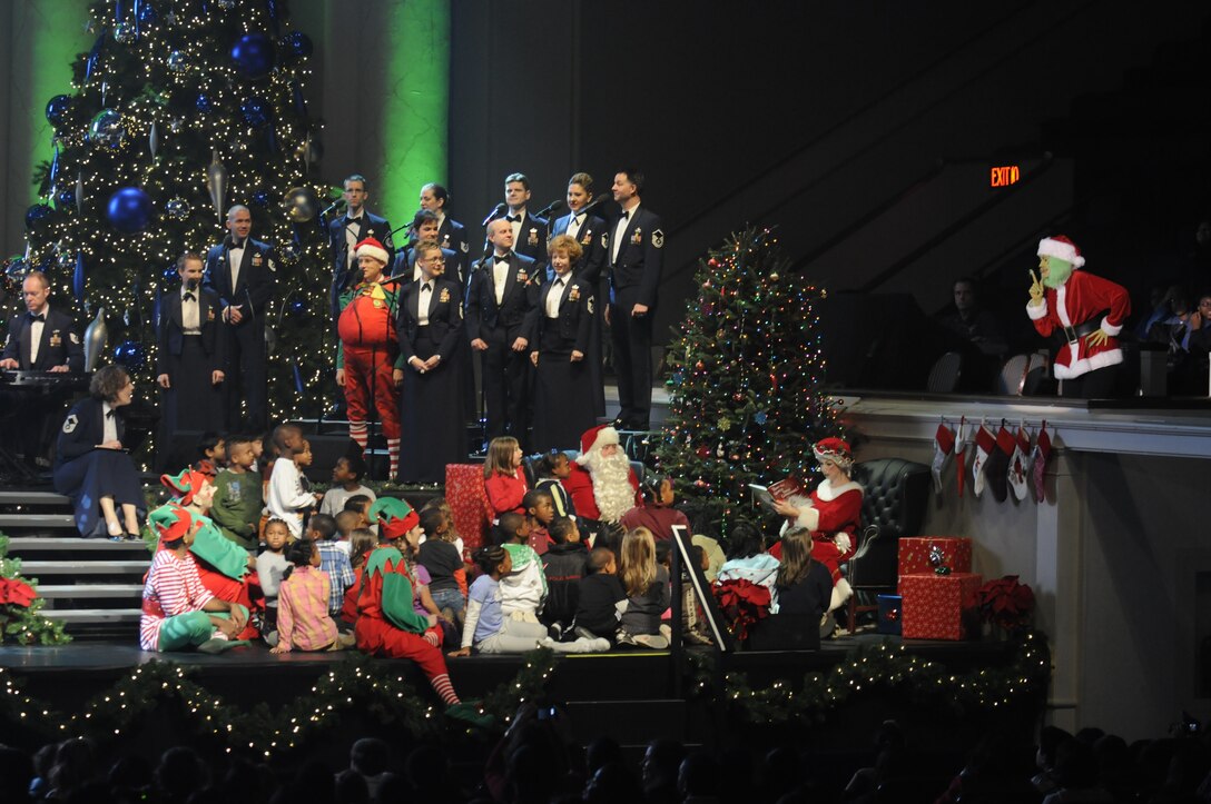 Children gather onstage for a reading of “How the Grinch Stole Christmas” during the 2010 Holiday Concert Series.  This year’s holiday celebration featured the Concert Band, Singing Sergeants and Ceremonial Brass at Daughters of the American Revolution Constitution Hall in “The Best Gift of All”.  If you missed this year’s holiday concerts, be sure to stay up-to-date by checking our website next fall for ticket information.  (U.S. Air Force Photo by Staff Sgt. Raymond Mills)