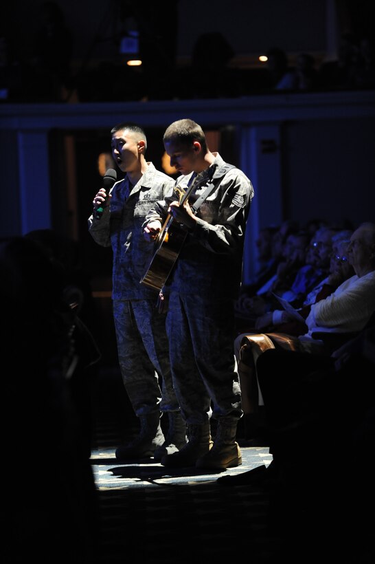 Tech. Sgts. Ben Park and Matthew Geist pay tribute to Airmen deployed to forward locations during a performance of  “Silent Night”.  This year’s holiday celebration featured the Concert Band, Singing Sergeants and Ceremonial Brass at the Daughters of the American Revolution Constitution Hall in “The Best Gift of All”.  If you missed this year’s holiday concerts, be sure to stay up-to-date by checking our website next fall for ticket information.  (U.S. Air Force Photo by Senior Airman Christopher Ruano)