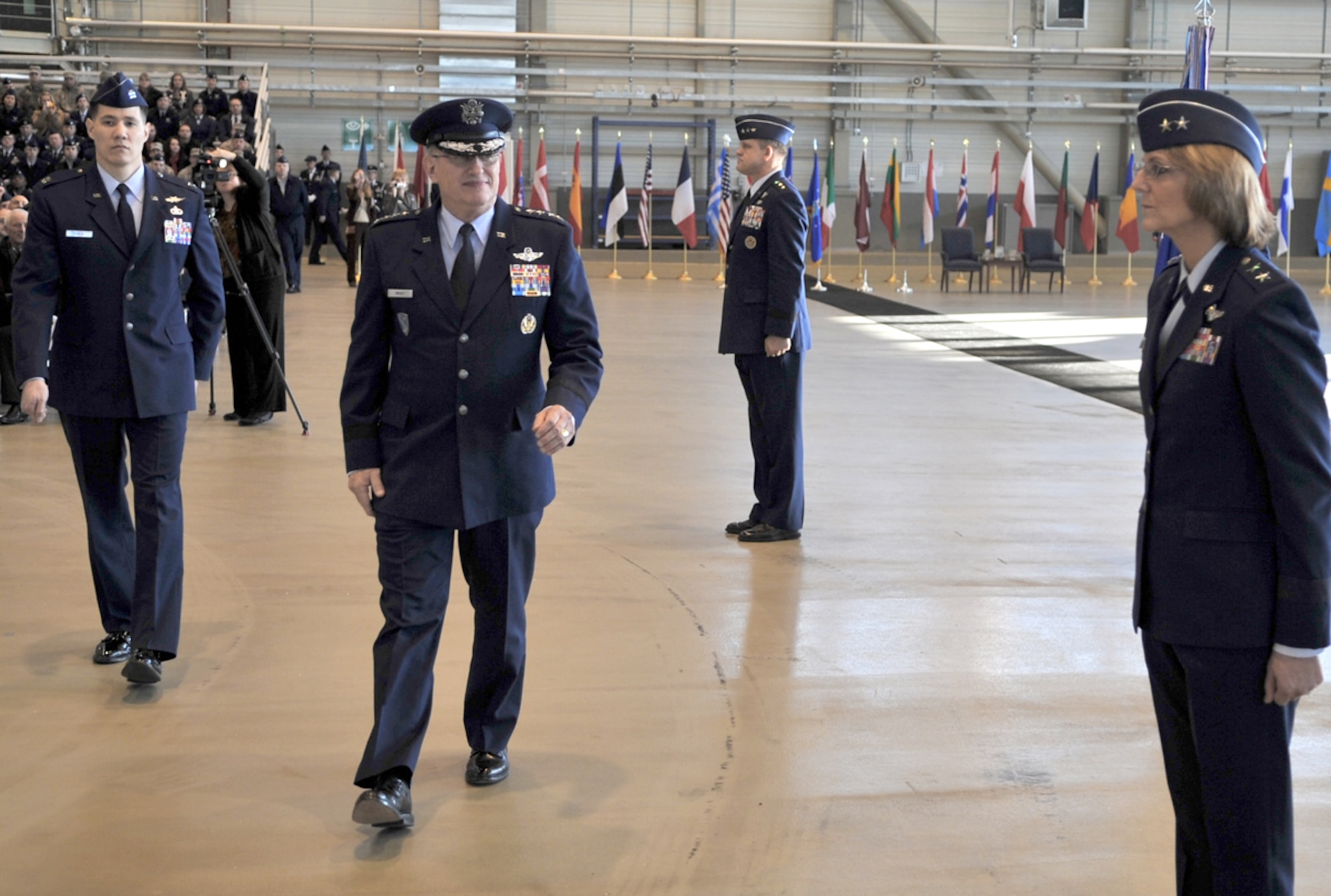 Gen. Roger A. Brady, the outgoing U.S. Air Forces in Europe commander, gives a final inspection to his Airmen during a change of command ceremony Dec. 13, 2010, at Ramstein Air Base, Germany. General Brady relinquished command to Gen. Mark A Welsh III during the change of command ceremony, after providing command and control for air, space and missile defense for activities in an area of operations covering almost one-fifth of the world, including 51 countries in Europe, Asia, the Middle East, and the Arctic and Atlantic oceans. (U.S. Air Force photo/Senior Airman Caleb Pierce) 