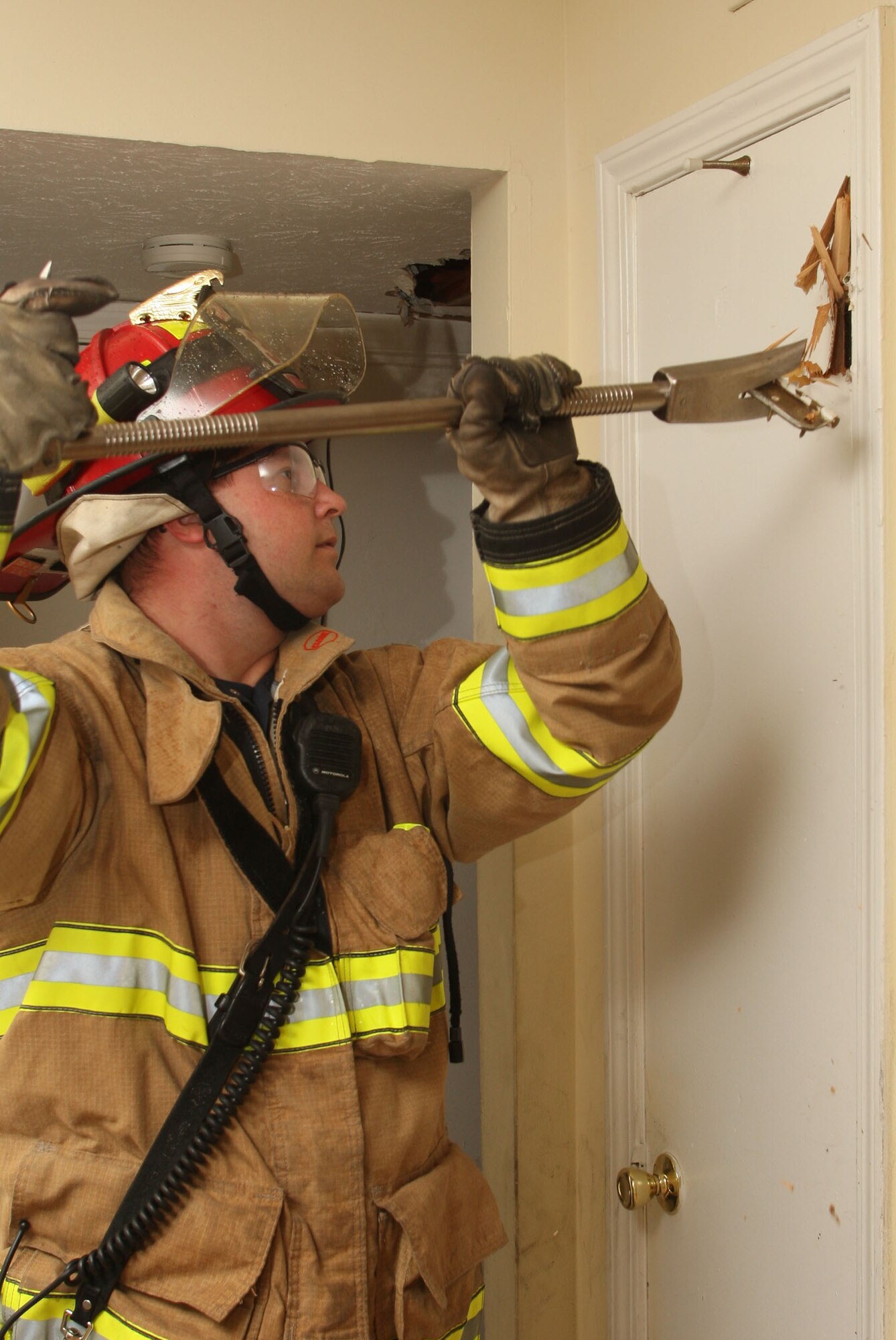 Firefighters from Dobbins Fire and Emergency Services trained on various techniques and equipment for forcible entry. (U.S. Air Force Photo/Don Peek) 
