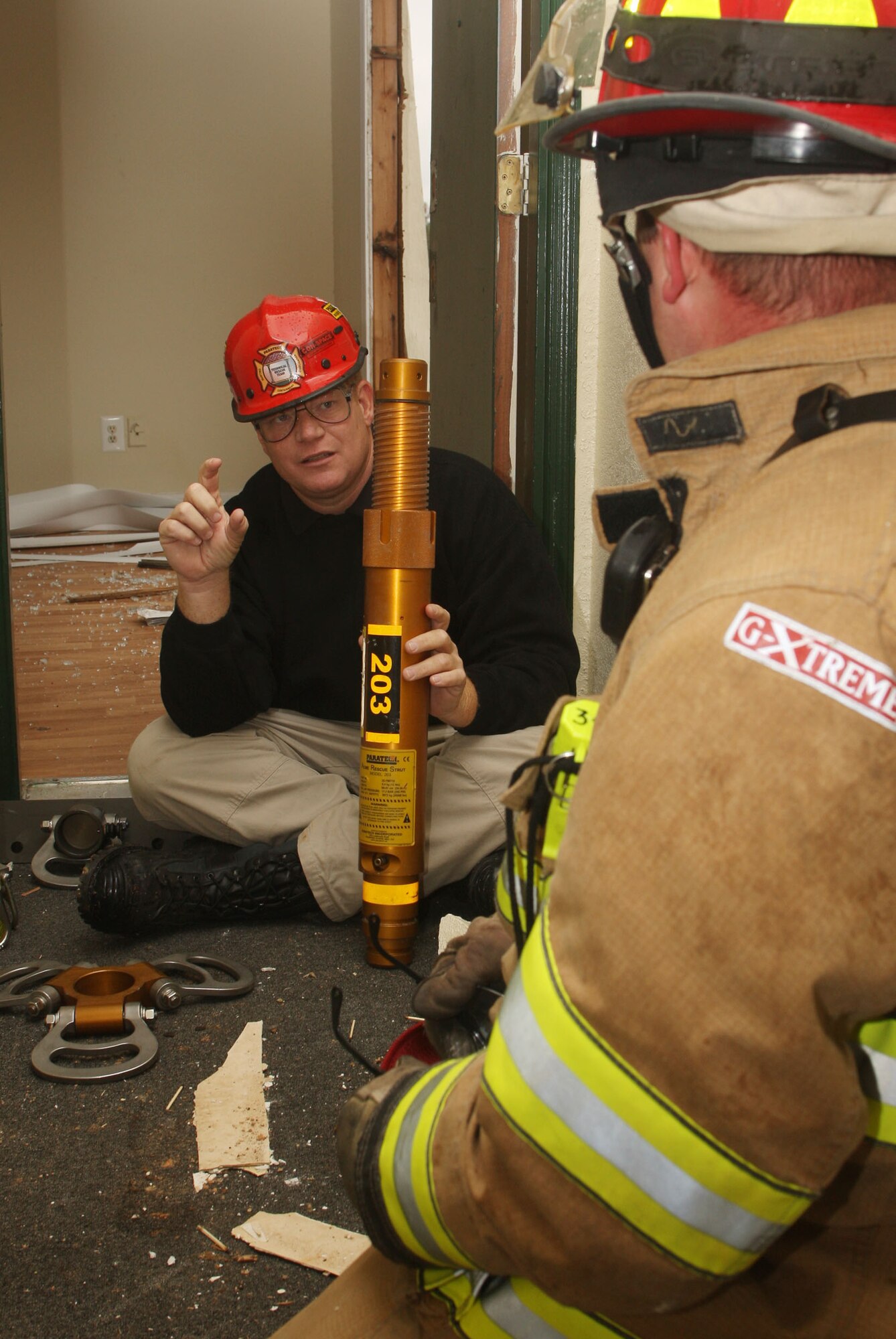 Steve Williamson from Paratech, Inc assisted in training firefighters from Dobbins Fire and Emergency Services on various techniques and rescue devices. (U.S. Air Force Photo/Don Peek) 