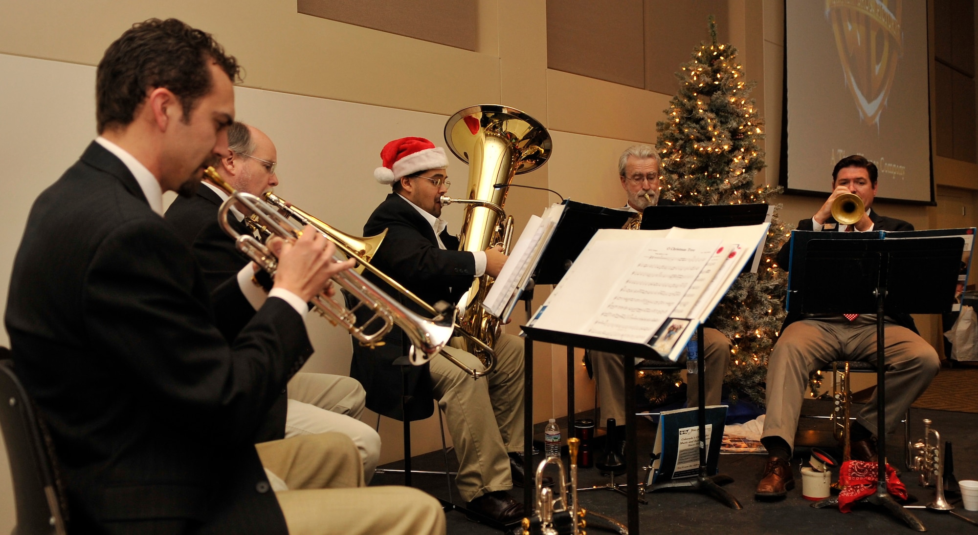 BUCKLEY AIR FORCE BASE, Colo. --
The Aurora Symphony Orchestra plays holiday music during the breakfast with Santa event Dec. 11, 2010. The Orchestra performed popular Christmas songs such as Rudolph The Red Nosed Reindeer and many others for the families.(Airman 1st Class Paul Labbe.)
