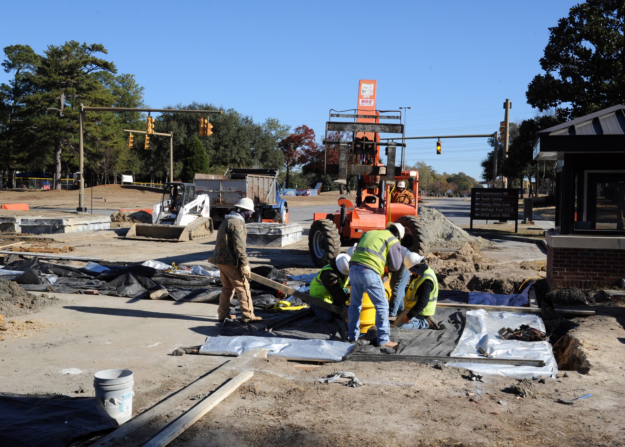 Construction on the barriers at the front gate  continues despite the cold
weather. Although traffic has been slowed due to detours, Joint Base
Charleston-Air Base Security Forces have also been braving the cold
temperatures to keep the flow of traffic moving.
