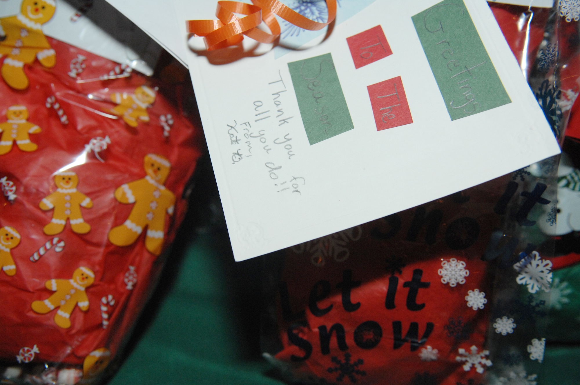 Cards made by Crawford Elementary School students were attached to bags of cookies for Airmen Dec. 9, 2010, Eielson Air Force Base, Alaska. The cookies were collected as part of Operation Cookie Crunch, a drive to collect cookies and distribute them to the Airmen living in the dorms. (U.S. Air Force photo/ Senior Airman Rachelle Coleman)