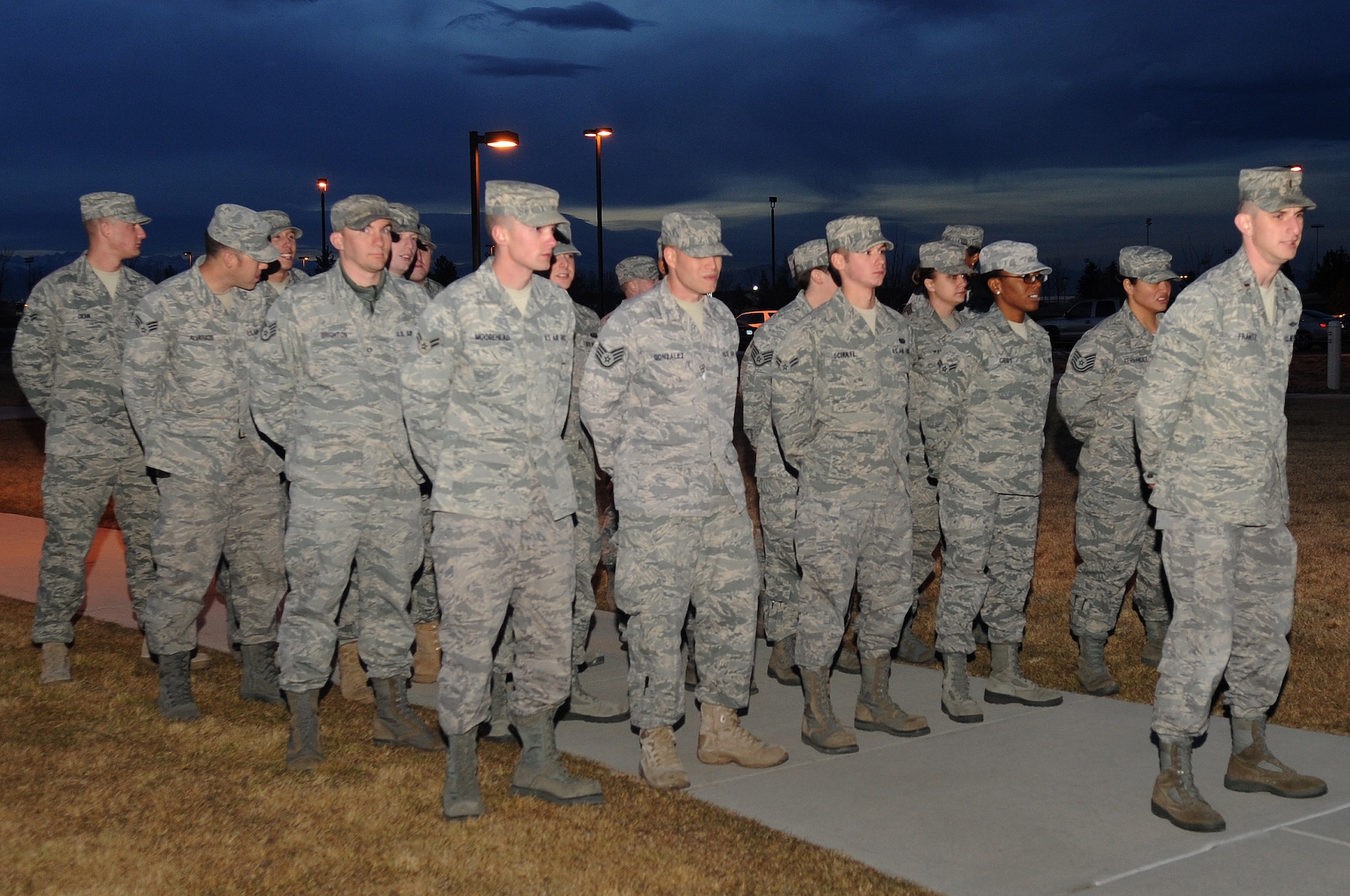 BUCKLEY AIR FORCE BASE, Colo.-- A 460th Space Communications flight honor Senior Airman Kristopher Mansfield at the annual tree lighting ceremony, Dec. 14, 2010. Airman Mansfield's parents speak about the importance of not drinking and driving. (U.S. Air Force photo by Airman Manisha Vasquez) 