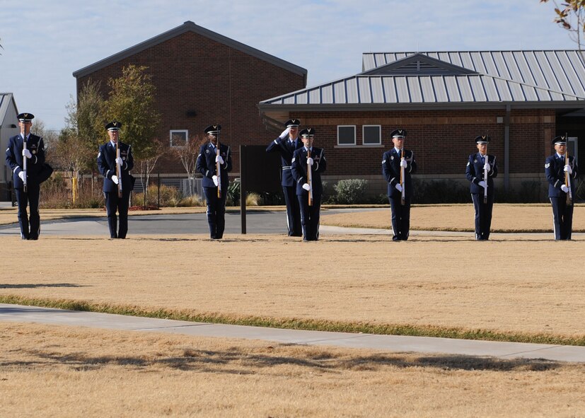ABILENE, Texas—Dyess Honor Guard pays tribute after a 21-gun salute Dec. 7 during a ceremony at the Texas State Veterans Cemetery at Abilene here. Dyess chiefs donated a headstone to the cemetery to honor servicemembers and fallen comrades. (U.S Air Force photo/ Airman 1st Class Shannon Hall) 
