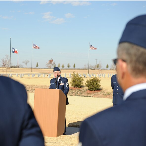 ABILENE, Texas—Retired Chief Master Sgt. Bob Mehaffey speaks to Dyess chiefs Dec. 7 at the Texas State Veterans Cemetery at Abilene here.  Dyess chiefs donated a headstone to the cemetery to honor servicemembers and fallen comrades. (U.S Air Force photo/ Airman 1st Class Shannon Hall)