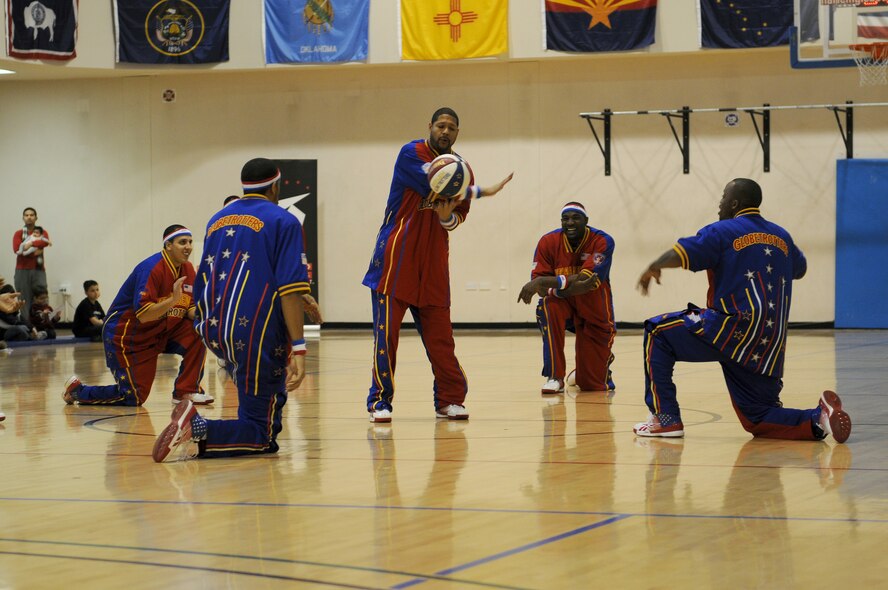 RAF MILDENHALL, England -- Handles Franklin shows off his ball-handling skills, to the Brother Bones'-whistled version of "Sweet Georgia Brown," while warming up for a game here Dec. 11, 2010. The Harlem Globetrotters performed at RAF Mildenhall as part of Navy Entertainment European tour. (U.S. Air Force photo/Senior Airman Tabitha M. Lee)