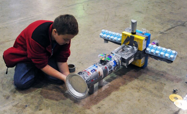 DAYTON, Ohio (11/2010) -- Children and adults of all ages enjoyed building an "Intercommunity Space Station" by adding pieces to a single group-built station during Family Day at the National Museum of the U.S. Air Force. (U.S. Air Force photo)