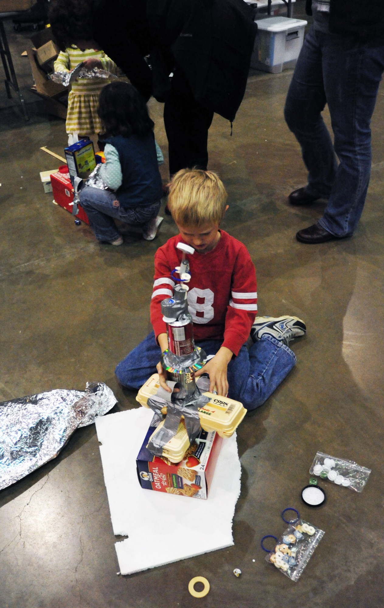DAYTON, Ohio (11/2010) -- Children and adults of all ages enjoyed building an "Intercommunity Space Station" by adding pieces to a single group-built station during Family Day at the National Museum of the U.S. Air Force. (U.S. Air Force photo)