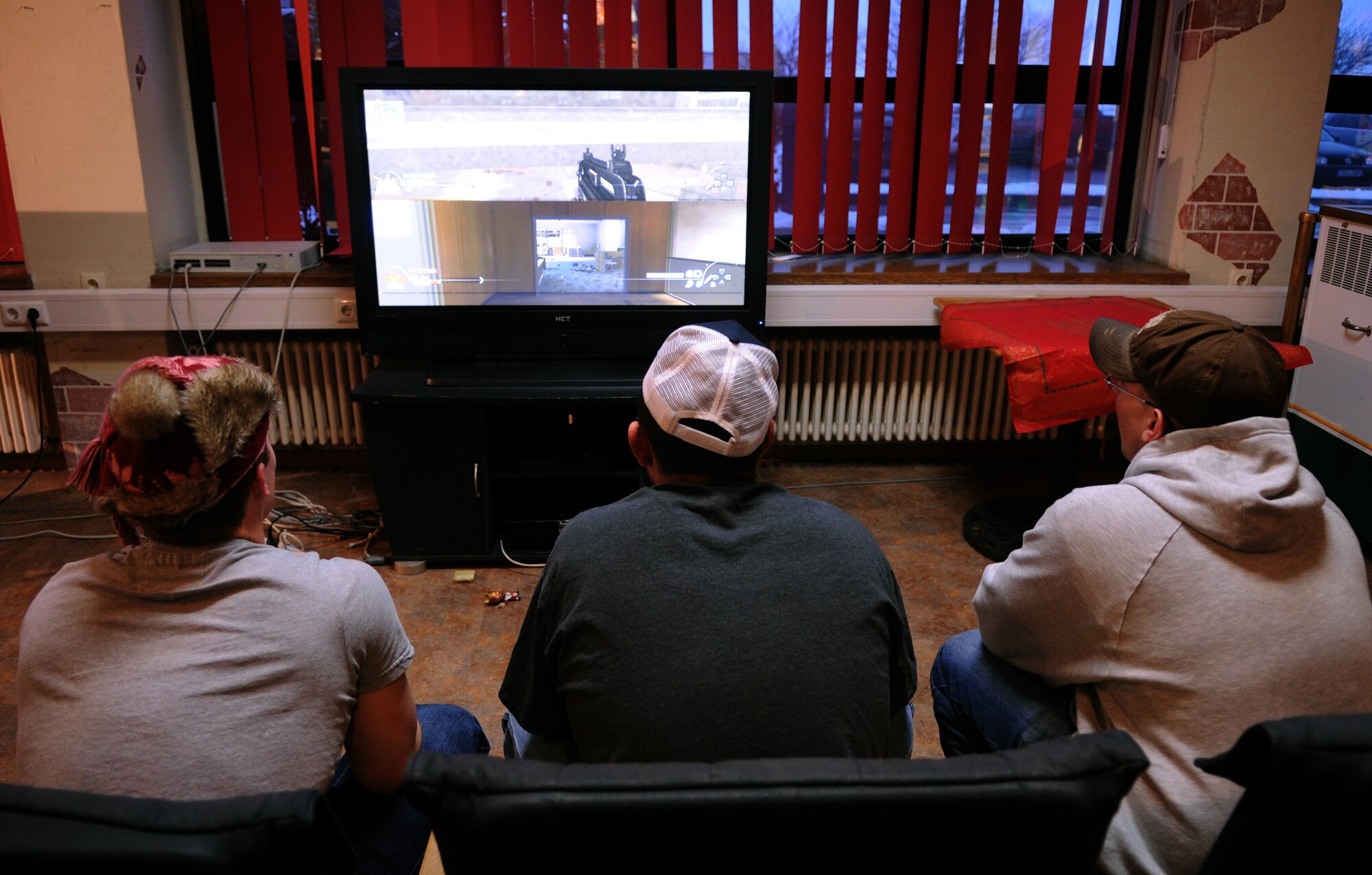 SPANGDAHLEM AIR BASE, Germany – Airmen from Spangdahlem Air Base compete in a video games tournament at the Unaccompanied Airmen’s Holiday Party Dec. 10. The event included free food, games and prizes for unaccompanied Airmen. (U.S. Air Force photo/Senior Airman Nathanael Callon)
