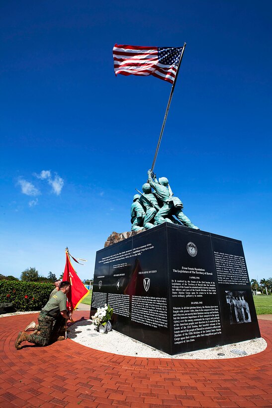 Marines with 3rd Marine Regiment honor the regiment’s fallen Marines and sailors while taking a knee at the Pacific War Memorial during a Fallen Heroes Run on Marine Corps Base Hawaii, Dec. 15, 2010. Since 2004, 116 Marines and sailors from 3rd Marine Regiment have been killed during operations in Afghanistan and Iraq. On Dec. 14 and 15, teams of at least two Marines or sailors in combat boots and camouflage trousers ran a 2-mile evolution 116 times — one for each fallen hero. The route took them from the 3rd Marine Regiment headquarters building to the Pacific War Memorial here and back.