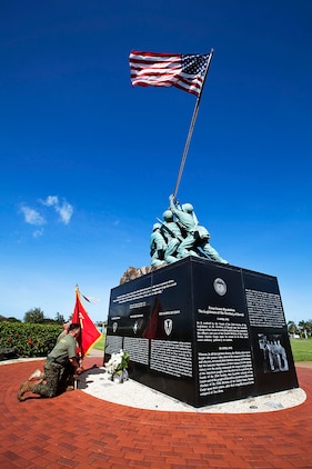 Marines with 3rd Marine Regiment honor the regiment’s fallen Marines and sailors while taking a knee at the Pacific War Memorial during a Fallen Heroes Run on Marine Corps Base Hawaii, Dec. 15, 2010. Since 2004, 116 Marines and sailors from 3rd Marine Regiment have been killed during operations in Afghanistan and Iraq. On Dec. 14 and 15, teams of at least two Marines or sailors in combat boots and camouflage trousers ran a 2-mile evolution 116 times — one for each fallen hero. The route took them from the 3rd Marine Regiment headquarters building to the Pacific War Memorial here and back.