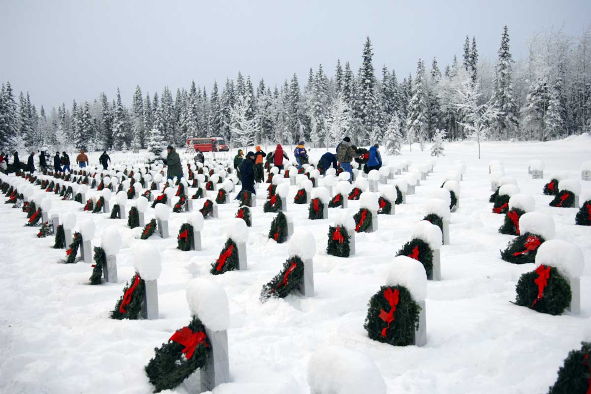Wreaths were laid on graves at Richardson National Cemetery, Saturday by Wreaths Across America volunteers. (U.S. Army photo/SSgt. Matthew Winstead)