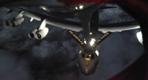 A B-52 Stratofortress is refueled by a KC-135 Stratotanker manned by members of the 96th and 203rd Air Refueling Squadrons over the Pacific Ocean Dec. 15 as part of the second sortie of the 96th ARS's first operational mission. During the mission, a 96th ARS KC-135 joined a KC-135 from the Iowa Air National Guard as part of a two-ship formation to refuel two B-52 Stratofortresses on the way to Guam. The KC-135s off loaded 105 thousand pounds of fuel to each of the B-52s. (U.S. Air Force photo/Airman 1st Class Lauren Main)