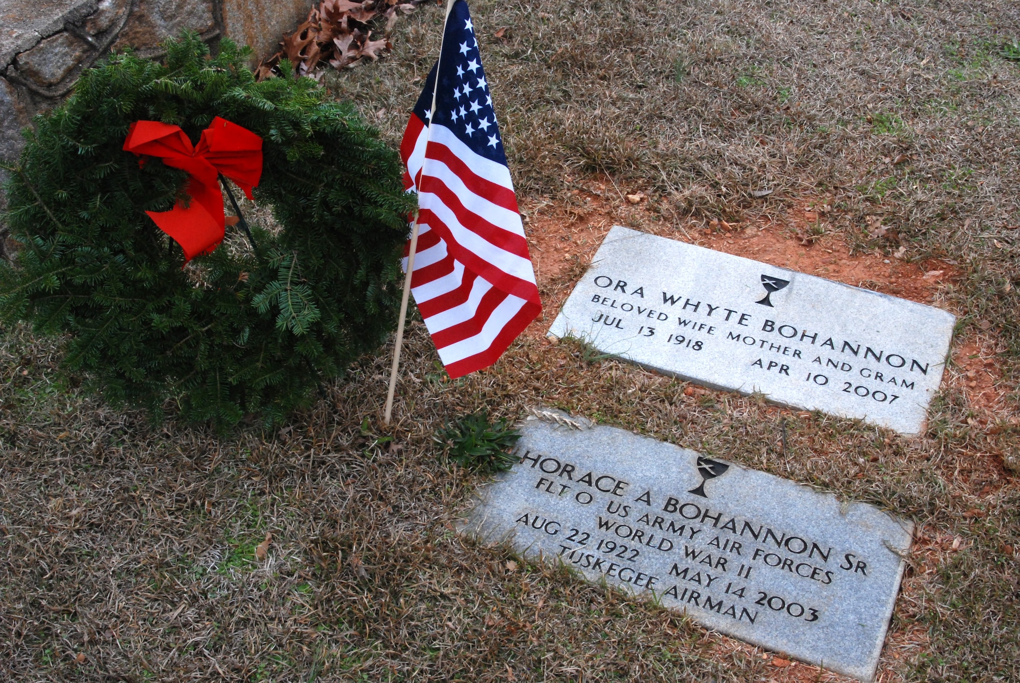 A ceremonial wreath and American Flag was placed at the gravesite of Lt. Horace Bohannon, a Tuskegee Airman flight officer who trained as a pilot during World War II and resided in Atlanta afterwards.  Lieutenant Bohannon was one of the co-founders of the Atlanta Chapter Tuskegee Airman, Inc. organization. Tuskegee Airman historical  information was provided by Ms. Zellie Orr, Tuskegee Airman historian. (U.S. Air Force photo/Master Sgt. Stan Coleman)