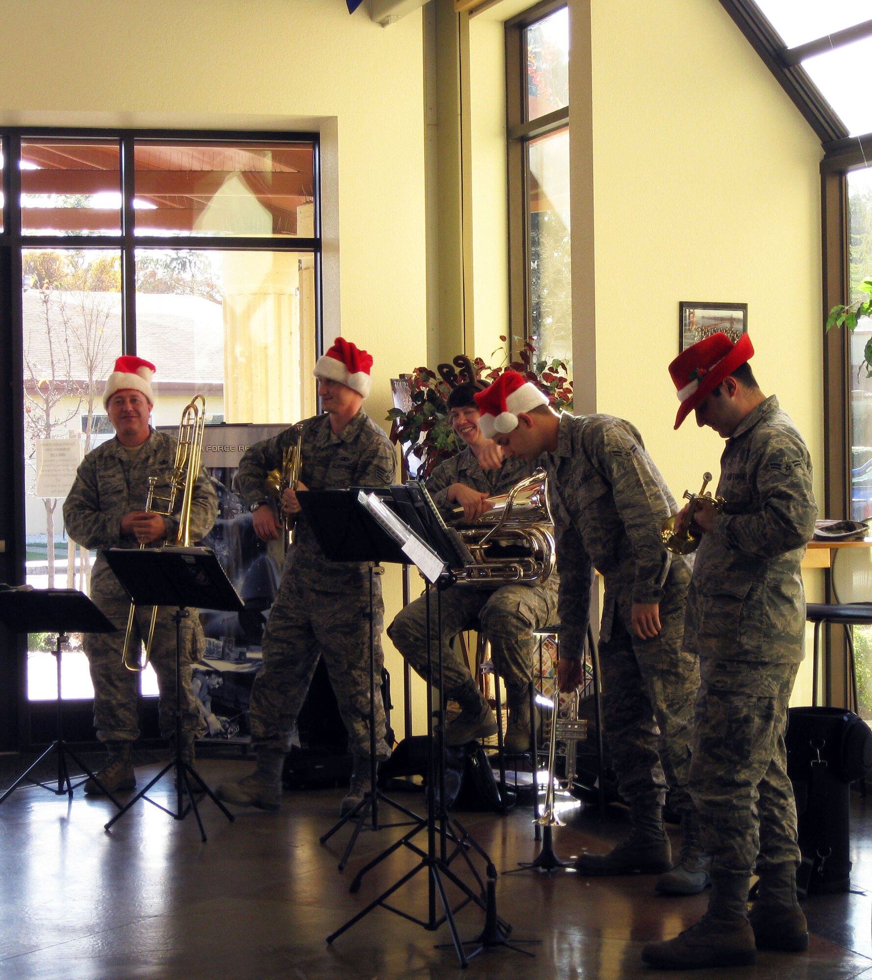 TRAVIS AIR FORCE BASE, Calif. Part of The Band of the Golden West will be came to the 349th Air Mobility Wing Headquarters building on Thursday Dec. 16 to play some Caroling songs. 

They played holiday songs for the folks gathered at the building's front entry to share in this rich holiday tradition. (U.S. Air Force photo/Patti Schwab-Holloway)