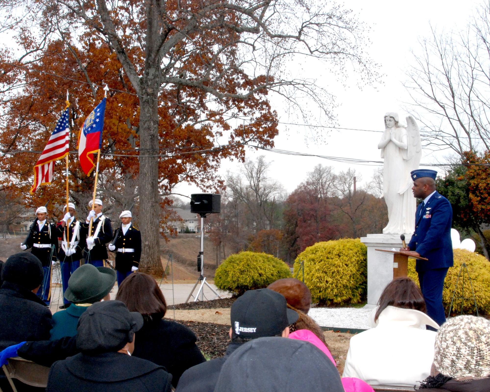 Capt. Darrell Bogan, 94th Airlift Wing Equal Opportunity officer, presented the opening remarks to more than 120 friends and relatives who came to commemorate the service of military veterans who were buried at South View Cemetery on Dec. 11.  Veterans who served in each war since World War I are buried at the Atlanta cemetery.  (U.S. Air Force photo/Master Sgt. Stan Coleman) 