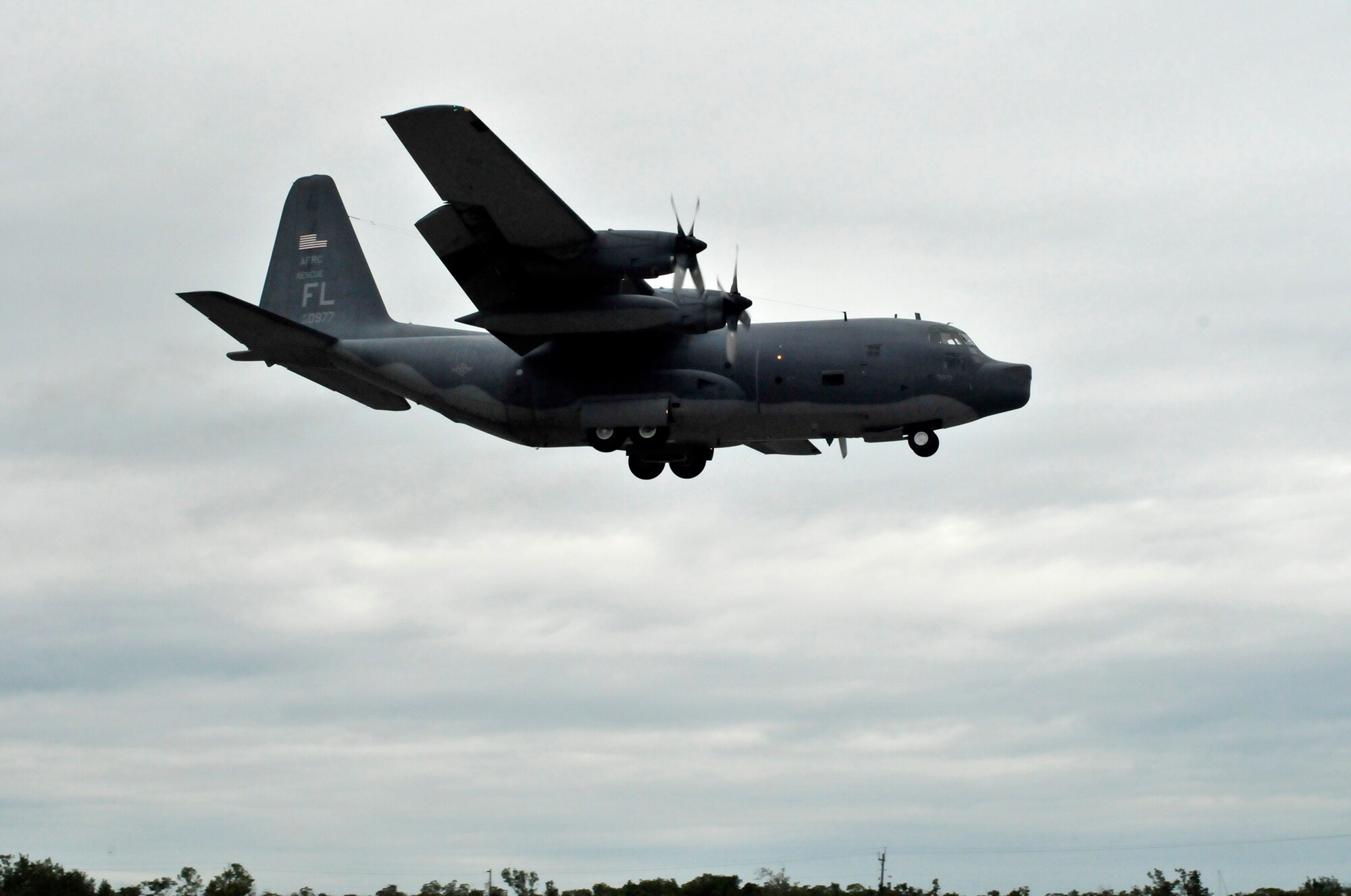 MARATHON KEY AIRPORT, Fla. - Airmen from the 920th Rescue Wing, Patrick Air Force Base, Fla. pilot three HC-130P/N Kings to the Florida Keys to participate in a joint search and rescue exercise with the Canadians Dec. 8-13, 2010. Here the Airmen are evaluated on their spot landings and equipment drop accuracy. (U.S. Air Force photo/Capt. Cathleen Snow)