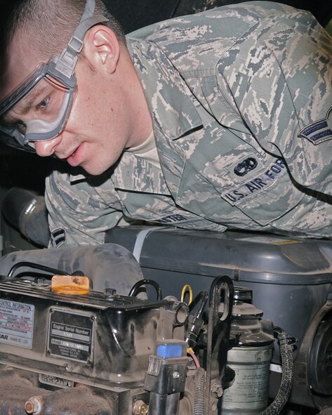 Airman 1st Class Scott Silvester performs an inspection of a Hyster forklift on Barksdale Air Force Base, La., Dec. 10, 2010. Airman Silvester is a vehicle and equipment maintenance apprentice assigned to the 2nd Logistic Readiness Squadron. (U.S. Air Force photo/Senior Airman La'Shanette V. Garrett)