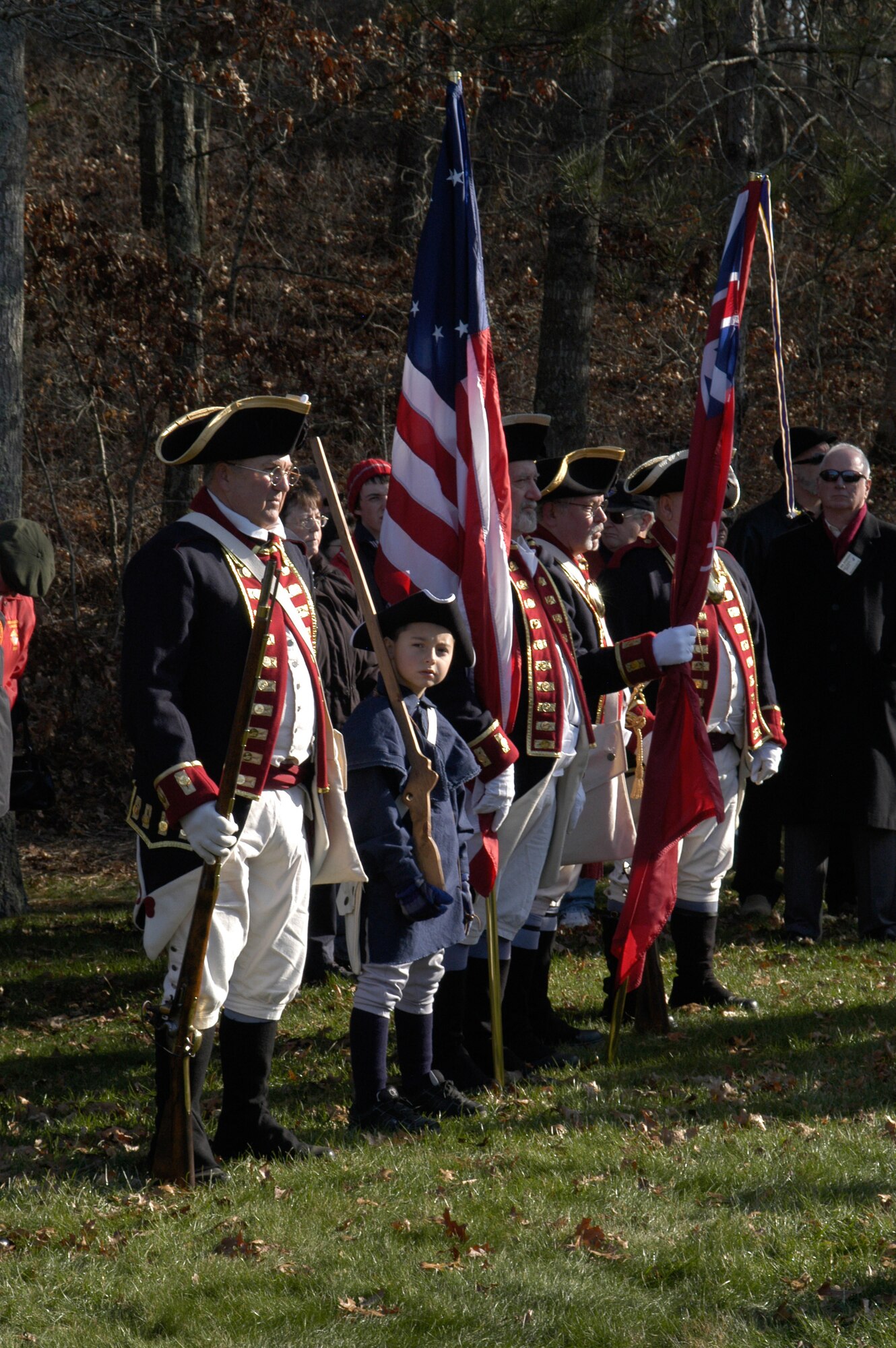 On December 11, 2010 military members, civilians and volunteers gathered for a solemn tribute to honor veterans in the annual Wreaths Across America ceremony held at the Massachusetts National Cemetery on Cape Cod. The ceremony is hosted by the Cape Cod Civil Air Patrol and the Knights of Columbus. ( U.S. Air Force photo/Major Nicole Ivers)