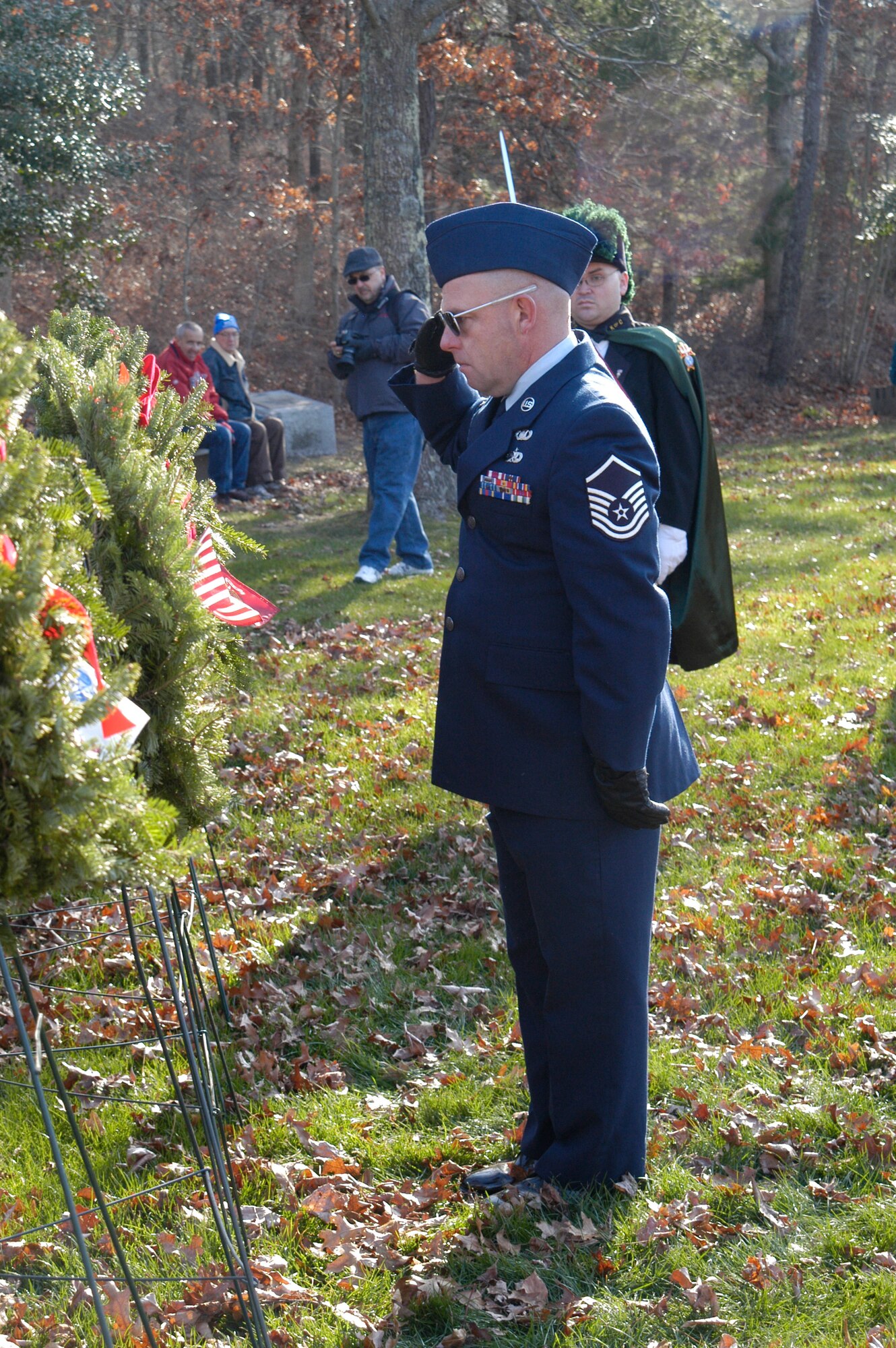 Master Sgt. Joey Johansen salutes the wreath to honor all Air Force members at the annual Wreaths Across America ceremony held on December 11, 2010. Military members, civilians and volunteers gathered for a solemn tribute to honor veterans in the annual Wreaths Across America ceremony held at the Massachusetts National Cemetery on Cape Cod. ( U.S. Air Force photo/Major Nicole Ivers)