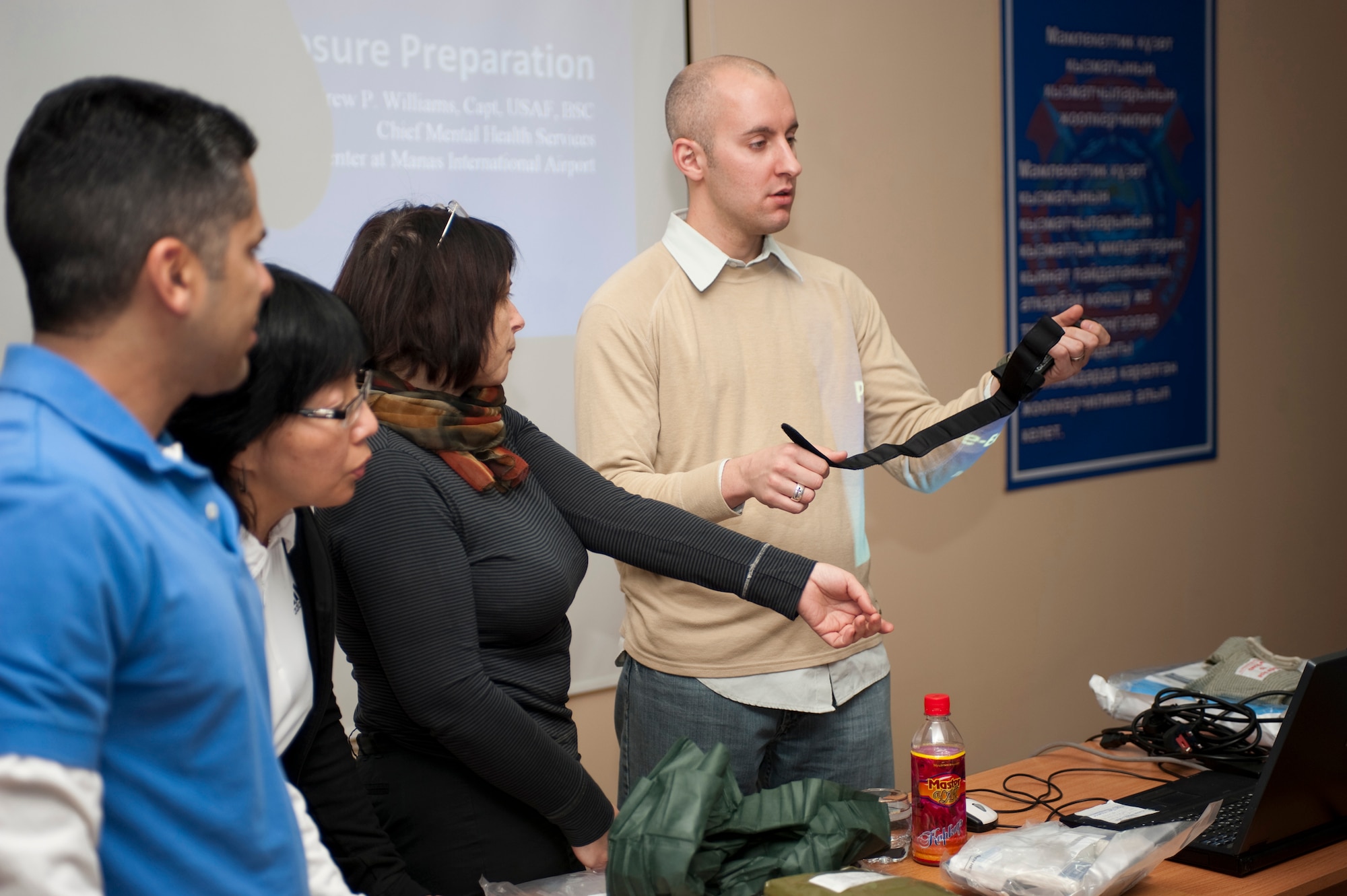 BISHKEK, Kyrgyzstan - Dr. (Capt.) Lance Black of the Transit Center at Manas gets ready to demonstrate how to use a tourniquet to members of the Kyrgyz Presidential Medical Team during a training session Nov. 24. (U.S. Air Force Photo/Staff Sgt. Michael Schocker)