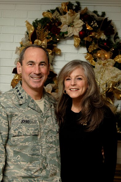 Gen. Raymond E. Johns Jr., and his wife, Diana, send holidays wishes to Mobility Airmen around the world. General Johns is the commander of Air Mobility Command.