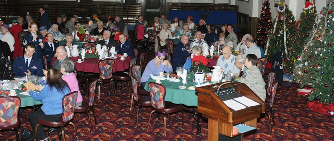 RAF MILDENHALL, England -- Local senior citizens and servicemembers enjoy a game of bingo during the 29th Annual Senior Citizens Luncheon here Dec. 16, 2010. This event was organized by the Top Three and sponsored by several base organizations to help maintain partnerships with the local communities. (U.S. Air Force photo/Senior Airman Tabitha M. Lee) 