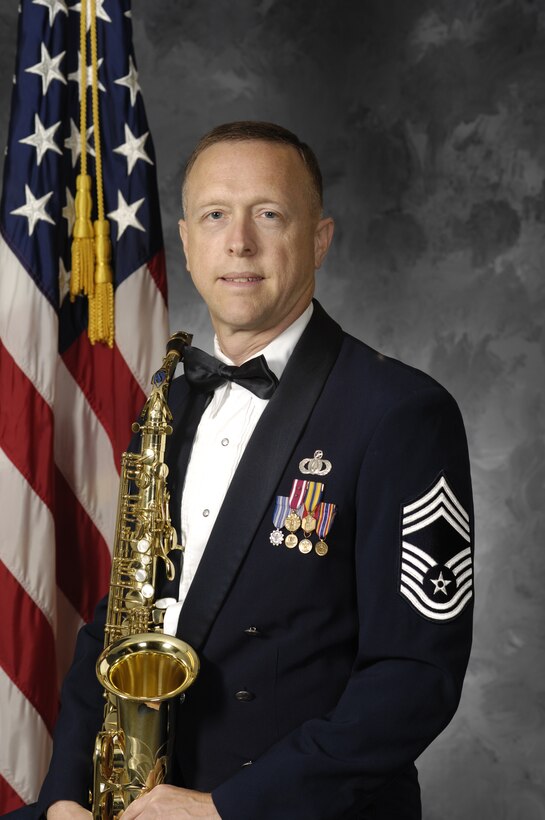 Chief Master Sgt. William Marr, the noncommissioned officer-in-charge of the Concert Band, was the featured instrumental soloist at the VMEA convention, performing Gunther Schuller's "A Tribute to Rudy". Chief Marr hails from Alexandria, Va., and grew up as a student in Virginia's Fairfax County Public Schools. More than a dozen other members of the Concert Band and Singing Sergeants grew up attending public schools in "The Old Dominion." (Official US Air Force Photo)