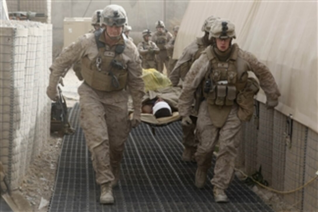 U.S. Marines with 3rd Battalion, 5th Marine Regiment and 3rd Battalion, 25th Marine Regiment prepare to medically evacuate an Afghan National Army soldier out of Forward Operating Base Jackson in Sangin, Helmand province, Afghanistan, on Dec. 6, 2010.  The battalion was part of Regimental Combat Team 2 which conducted counterinsurgency operations in partnership with the International Security Assistance Force.  