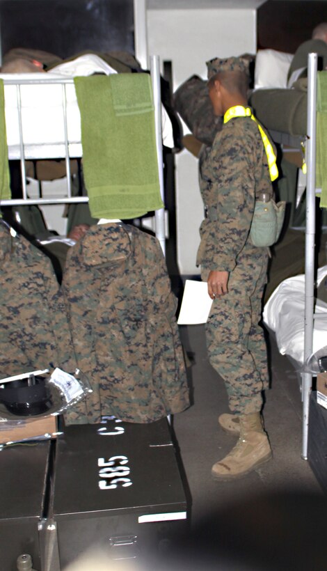 Recruits are tasked with waking each other for their shifts as interior guards. They take turns with one-hour shifts on guard to ensure their squad bay, belongings and weapons are safe and secure.