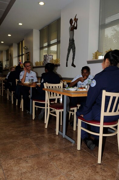 Members of the Marshall High School Junior and Reserve Officer Training Course eat lunch at the Red River Dining Facility on Barksdale Air Force Base, La., Dec. 13 during a tour of the installation. (U.S. Air Force photo/Staff Sgt. Terri Barriere)