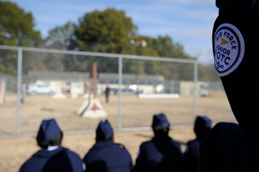 Members of the Marshall High School Junior and Reserve Officer Training Course view a military working dog demonstration during their tour to Barksdale Air Force Base, La., Dec. 13. (U.S. Air Force photo/Staff Sgt. Terri Barriere)