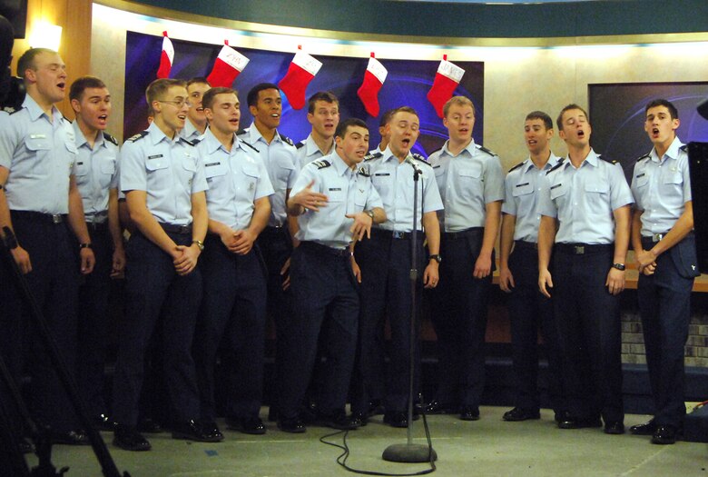 Air Force Academy cadets with the a cappella group "In the Stairwell" perform a medley of Christmas music live Dec. 10, 2010, during a morning show of a local TV station in Colorado Springs, Colo. The group performs for several events each year in the Colorado Springs and Denver areas. (U.S. Air Force photo/John Van Winkle)