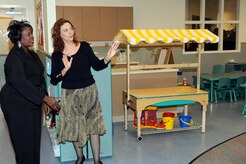 Mrs. Delores Phelps, left, gives Mrs. Carmen Mikolajcik, right, a tour of the new General Thomas R. Mikolajcik Child Development Center during the rededication ceremony at Joint Base Charleston on Dec. 16, 2010. The new center is able to serve more than 300 children and replaced a 38-year-old facility that could handle about half as many children. Mrs. Phelps is the CDC director and Mrs. Mikolajcik is the wife of former General Mikolajcik. (U.S. Air Force photo/Staff Sgt. Marie Brown)