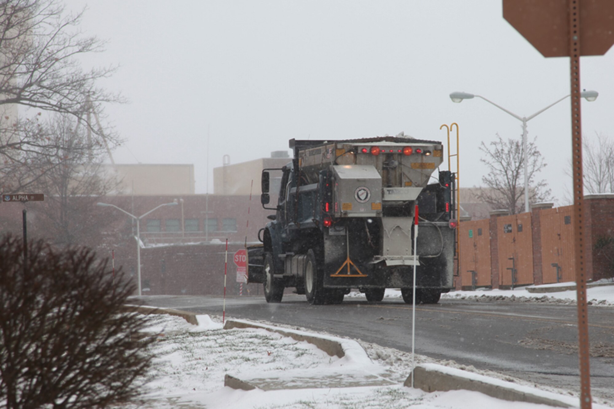 Road clearing crews work around the clock to improve street conditions, Dec. 13, with several inches of snow projected to fall in the next twelve hours.