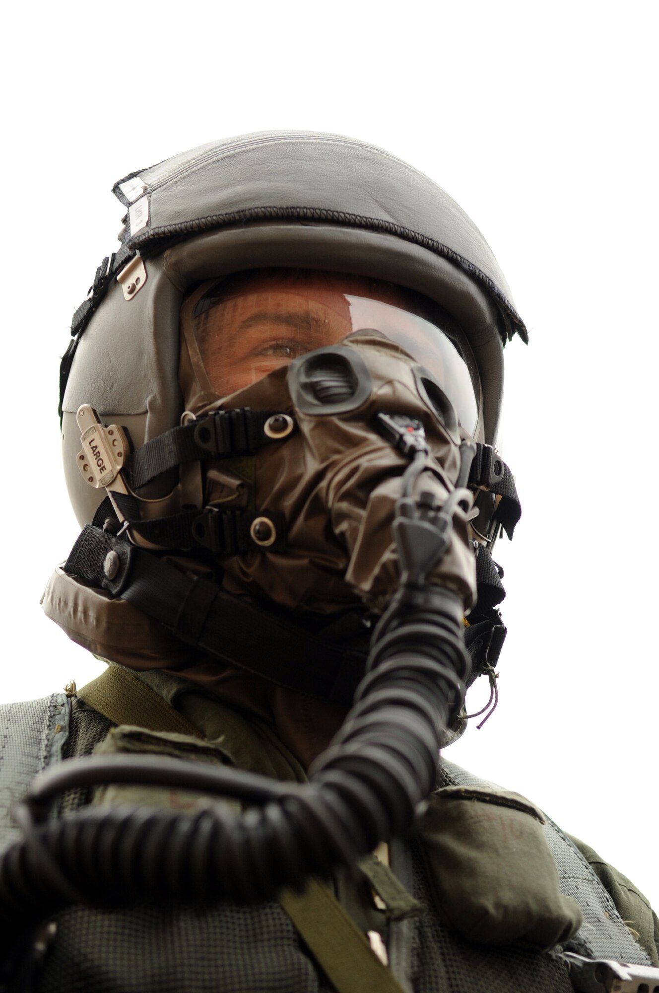 MOODY AIR FORCE BASE, Ga. -- A 23rd Fighter Group A-10C Thunderbolt II pilot, walks through the first zone of decontamination stations Dec. 17. In zone I, pilots get their chemical warfare gear sprayed and cleaned to prevent contamination. (U.S. Air Force photo/Airman 1st Class Douglas Ellis)(RELEASED)