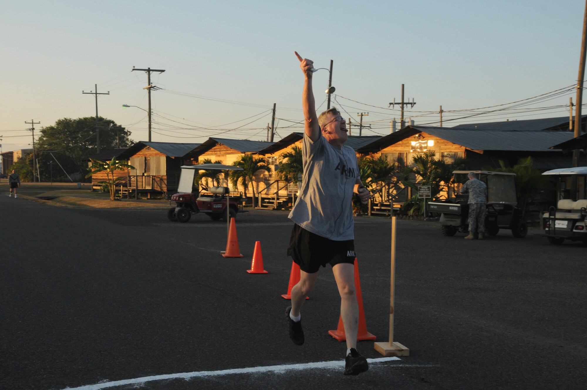 The Jingle Bell Run took place at Soto Cano Air Base, Dec. 16. Members basewide ran the nearly 3.5 mile run/walk enthusiastically adorning jingle bells and Santa hats. Morale Welfare and Recreation sponsored the event and t-shirts were awarded to the first 150 members who completed the run. American Forces News was also on scene videoing and interviewing participants. (U.S. Air Force photo/Staff Sgt. Kimberly R. Moore)
