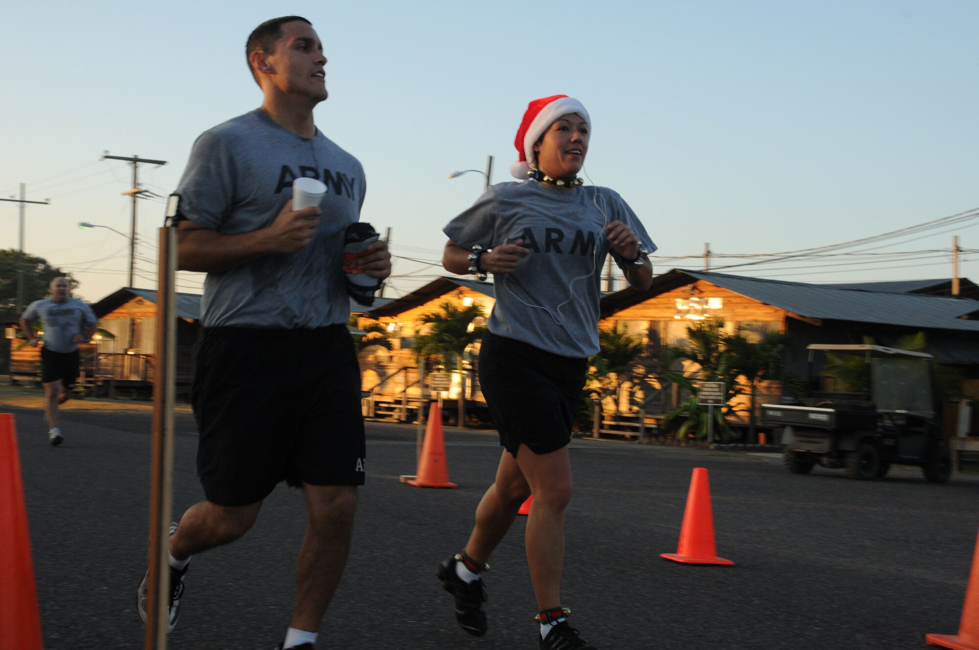 The Jingle Bell Run took place at Soto Cano Air Base, Dec. 16. Members basewide ran the nearly 3.5 mile run/walk enthusiastically adorning jingle bells and Santa hats. Morale Welfare and Recreation sponsored the event and t-shirts were awarded to the first 150 members who completed the run. American Forces News was also on scene videoing and interviewing participants. (U.S. Air Force photo/Staff Sgt. Kimberly R. Moore)